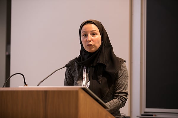 SIOE conference photo: Marzyeh Ghassemi presenting at SIOE.